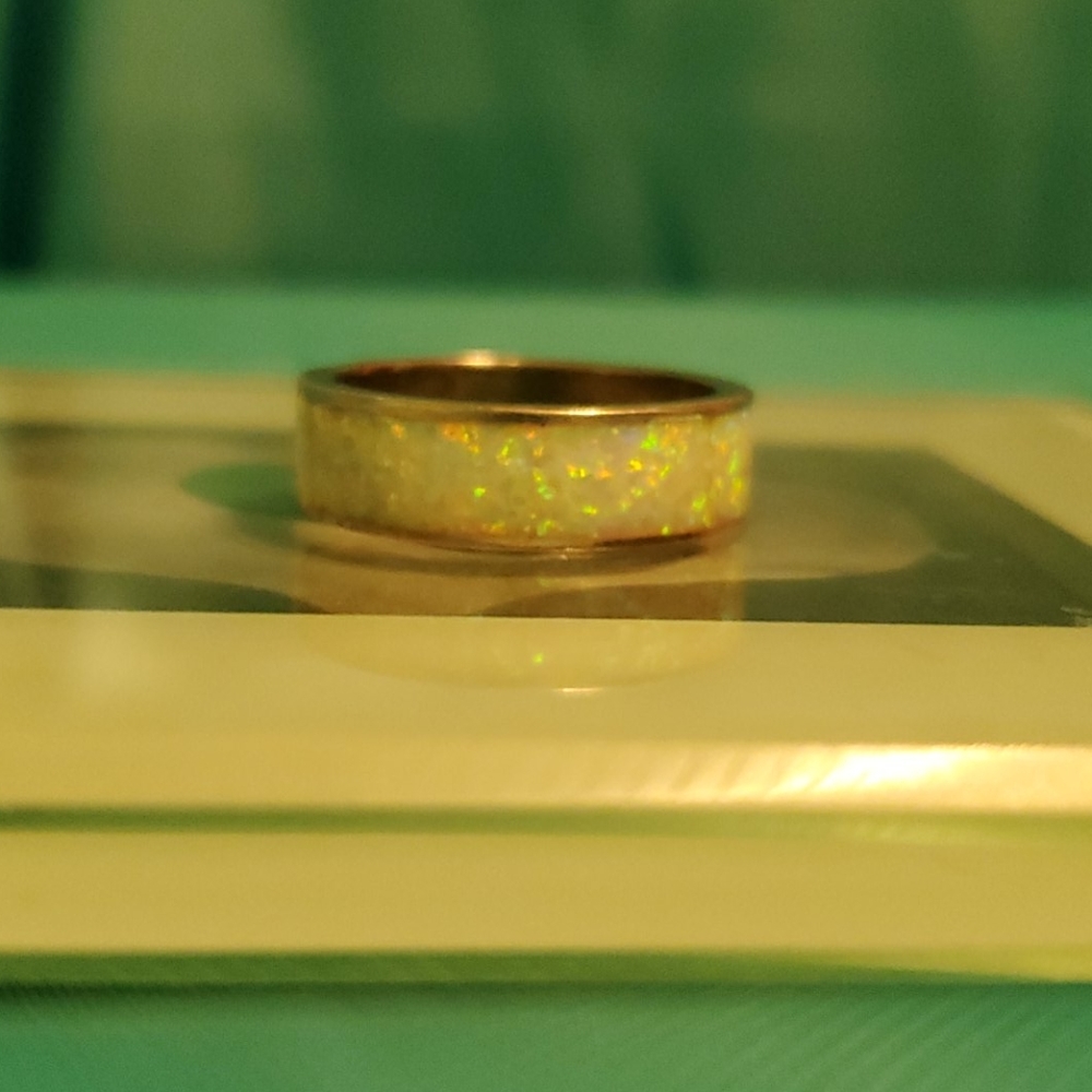 Womens size 9 opal ring inlaid on silver band
